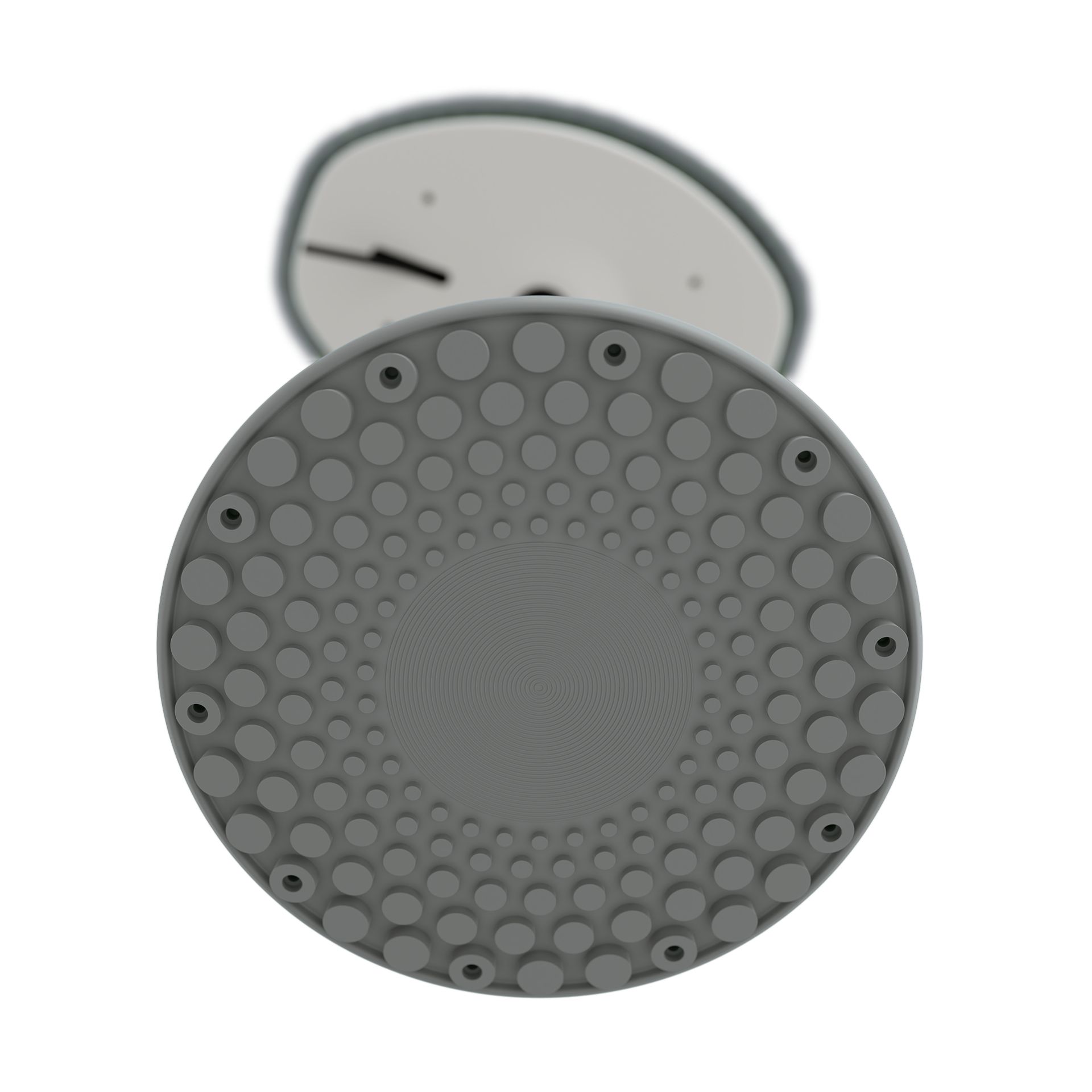 Runder, grauer Duschkopf mit kreisförmigen Vertiefungen, von unten gesehen.