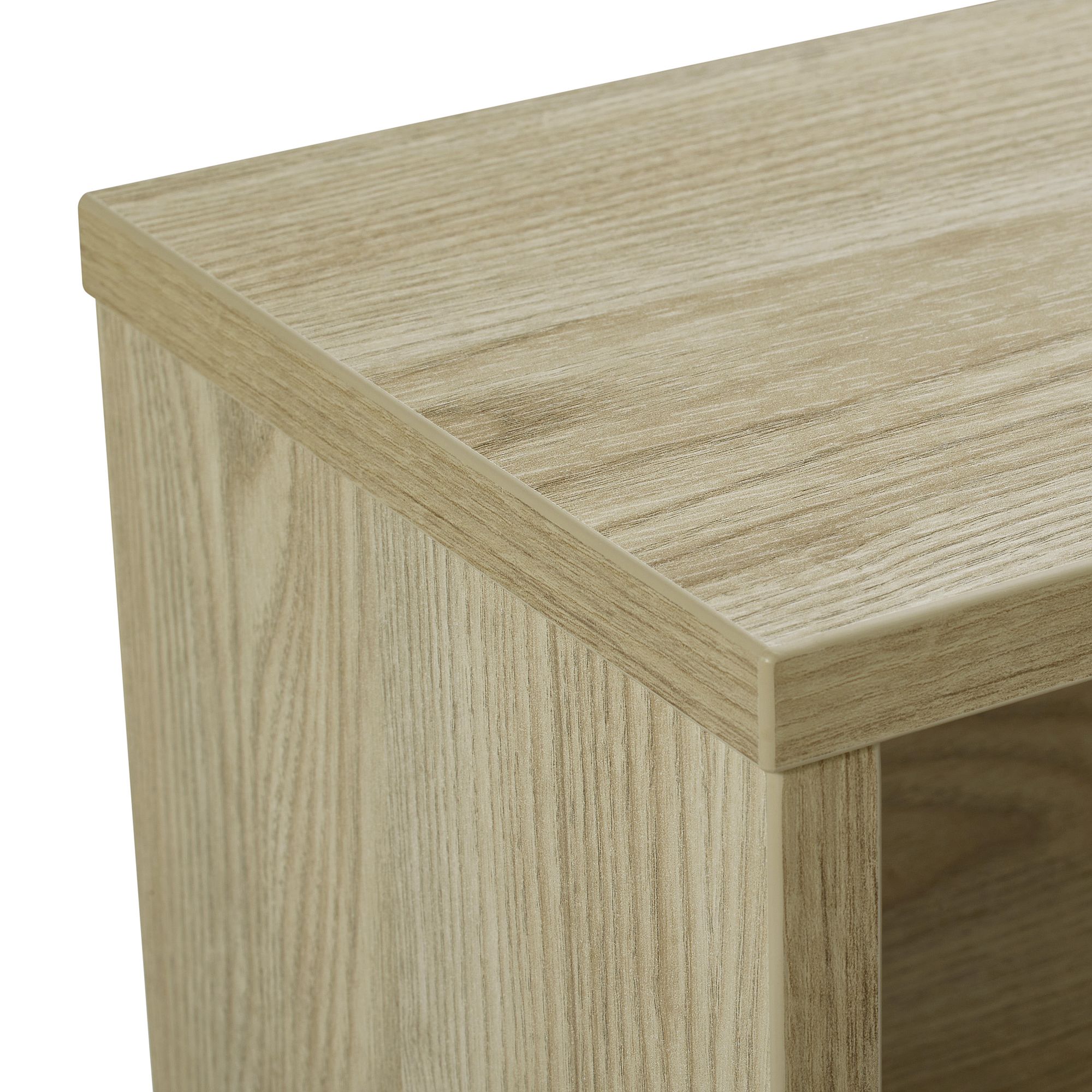 Wandregal  Wandbox  rechteckig  in Eiche-Montana Nahaufnahme einer hellen Holztischecke mit sichtbarer Holzmaserung.