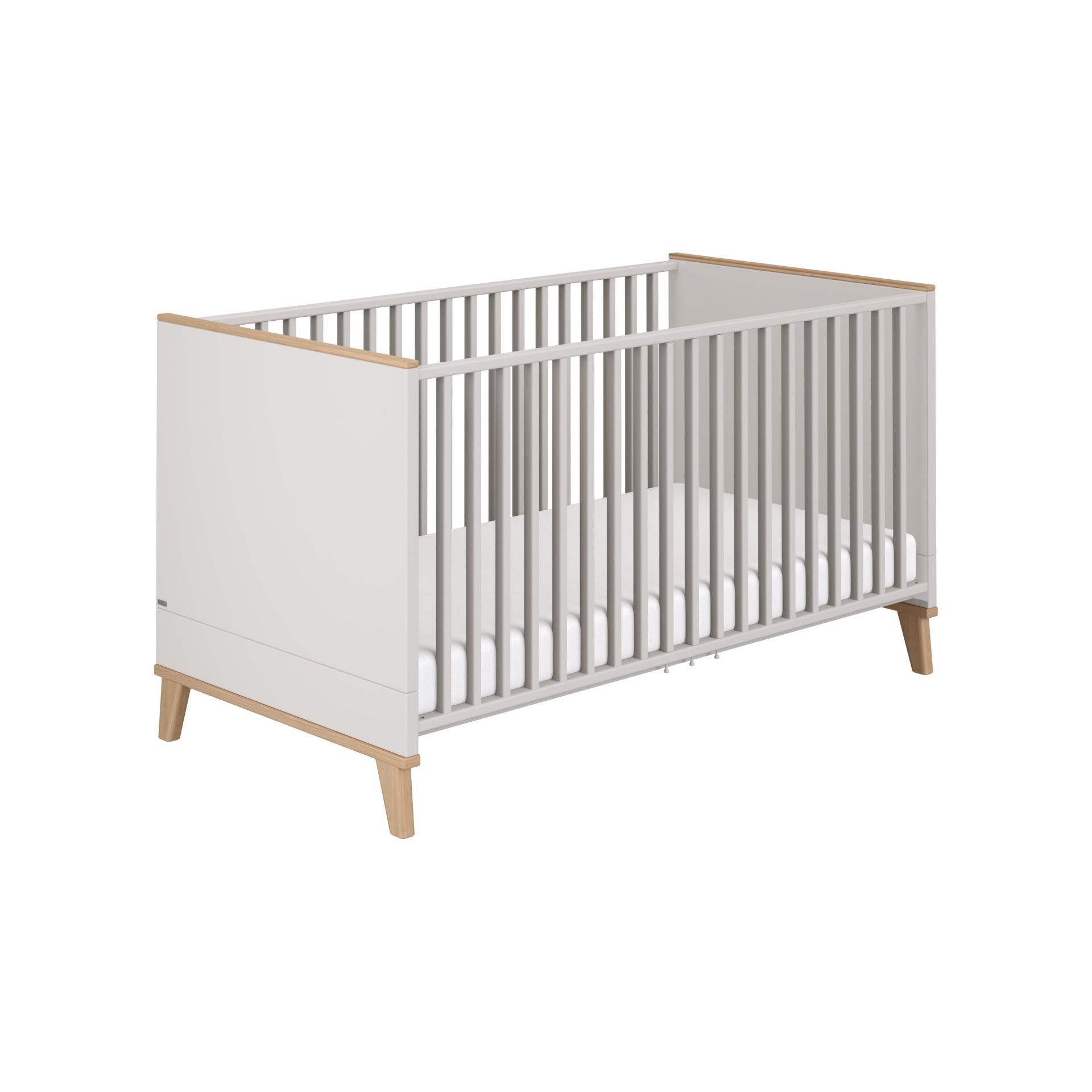 White and wood baby crib with slatted sides and minimalist design.