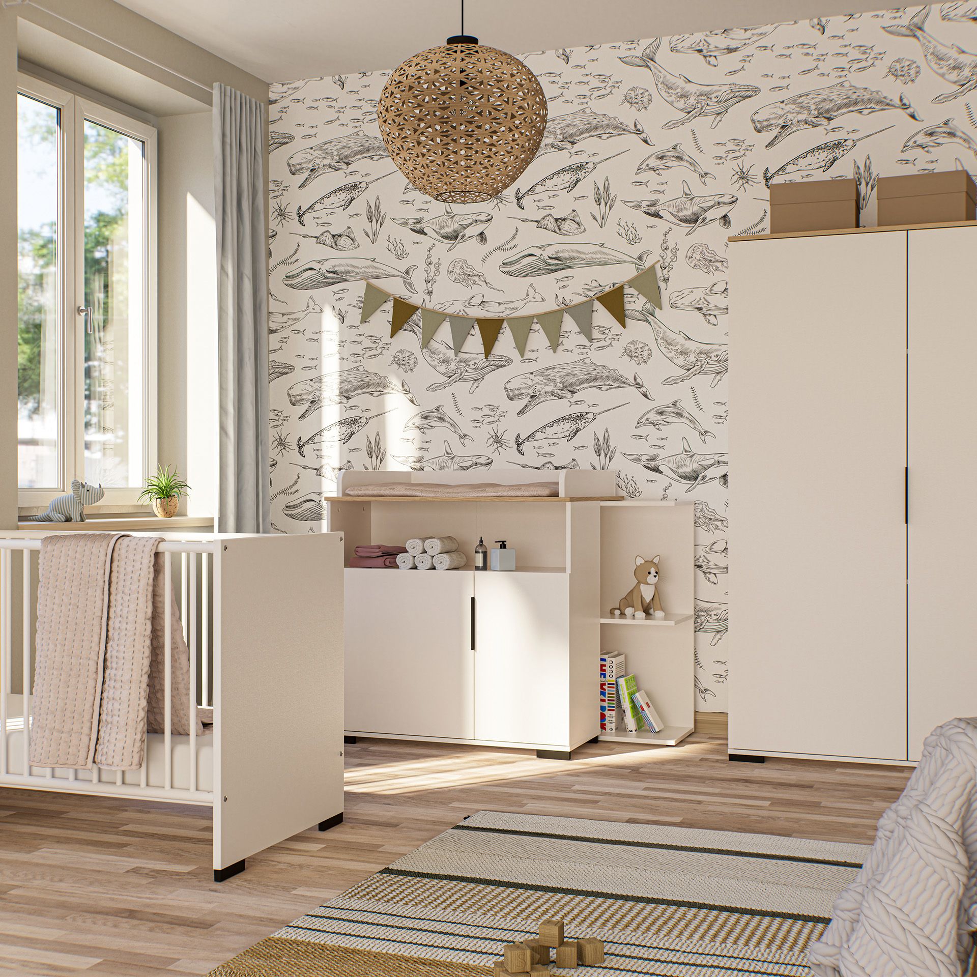 Bright nursery with crib, storage units, whale wallpaper, and a window.