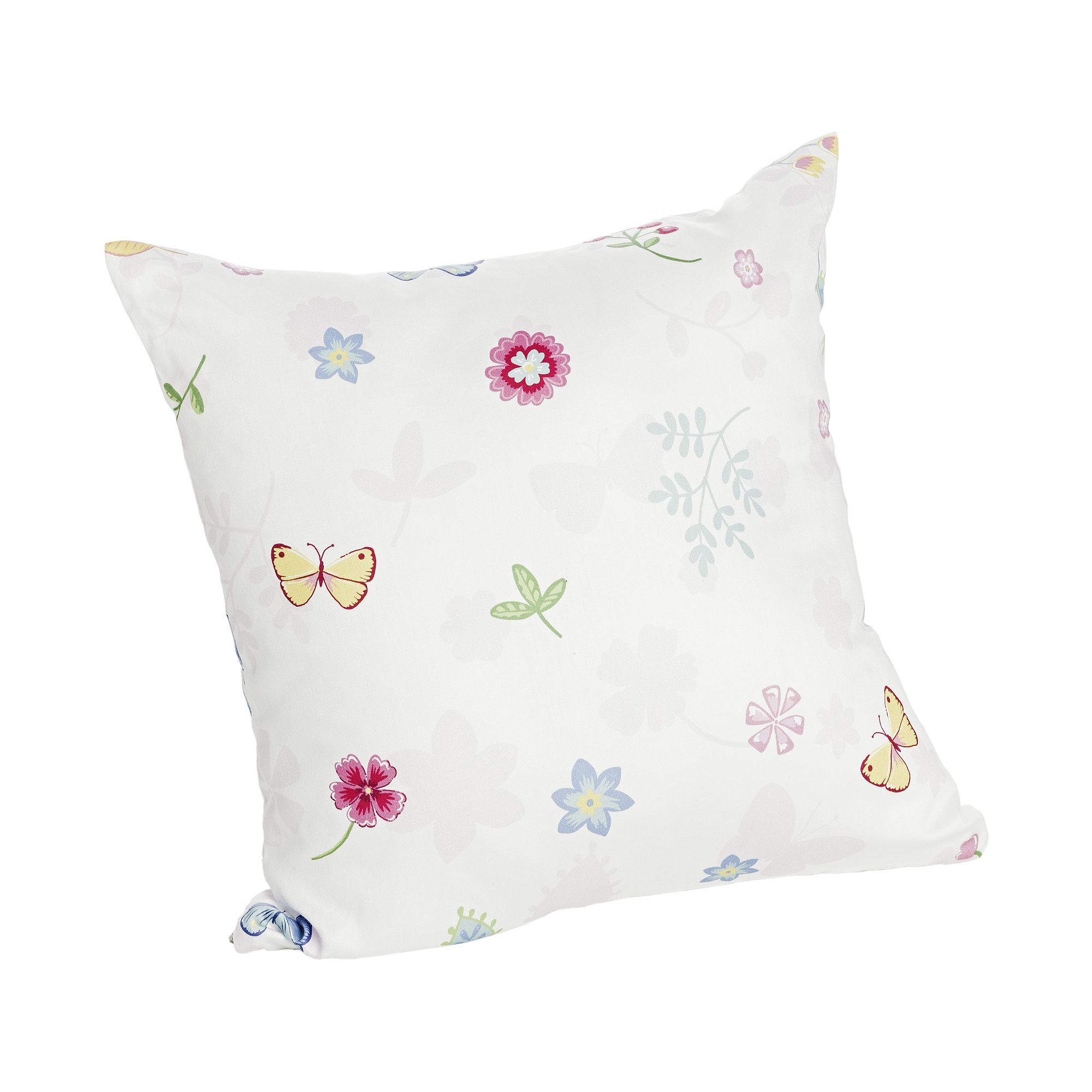 White pillow with colorful butterfly and flower patterns on it.