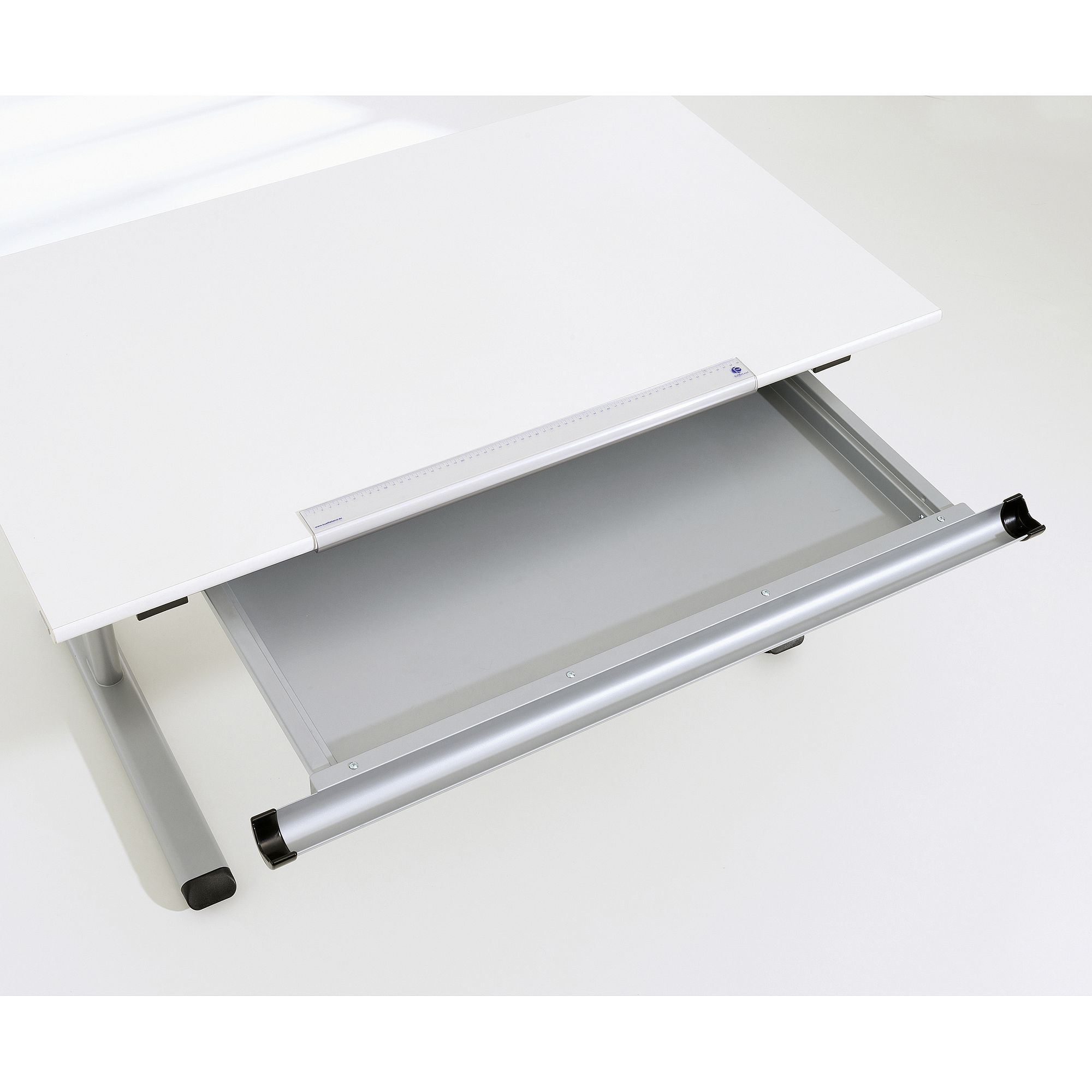 White desk with a sliding silver keyboard tray partially pulled out.
