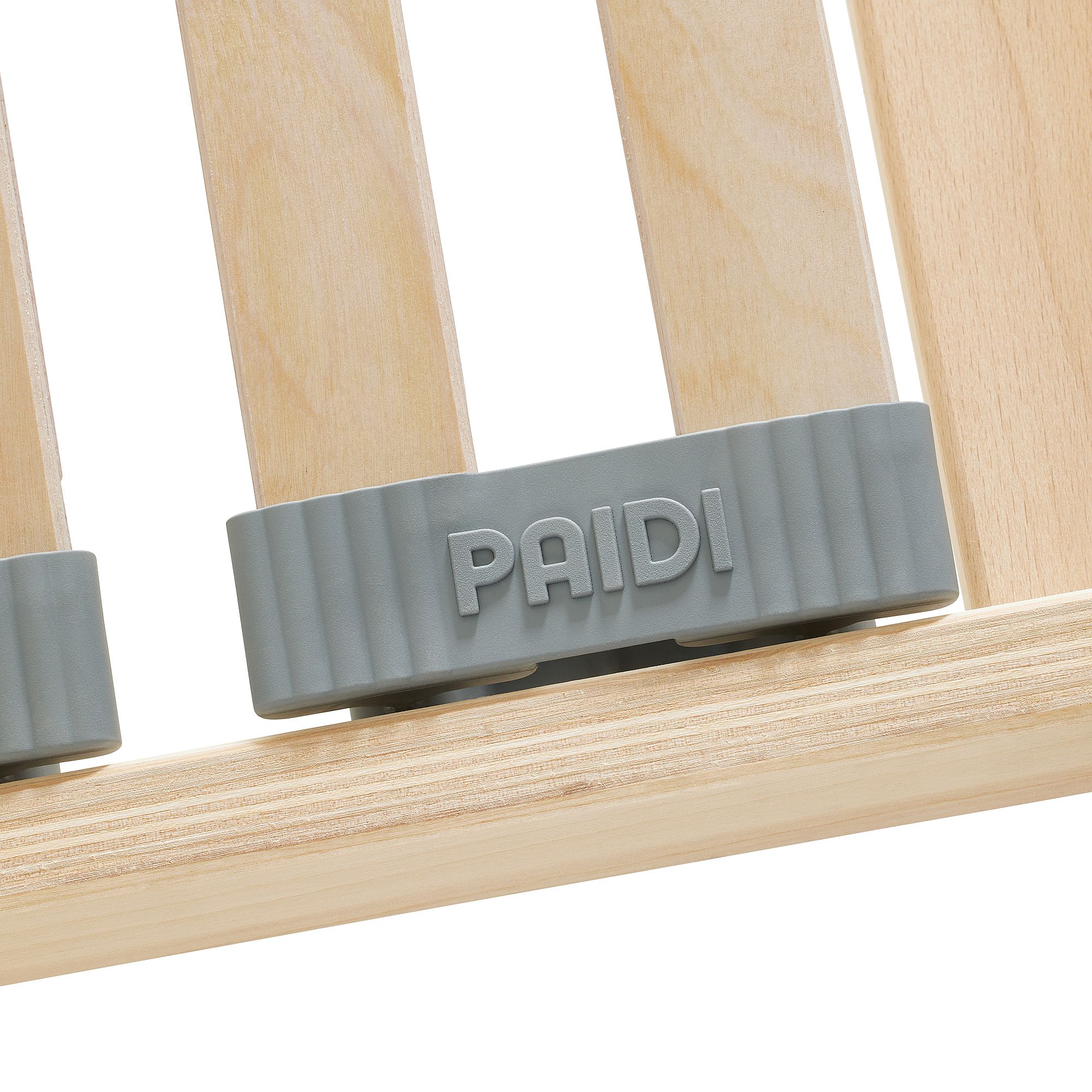 Lattenrost  Comfort mit Härteverstellung in 140 x 200 cm Nahaufnahme einer Holzlatte mit einem grauen Kunststoffteil mit der Aufschrift PAIDI.